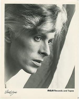 Bild des Verkufers fr Two original photographs of David Bowie promoting his appearance in the 1976 film The Man Who Fell to Earth zum Verkauf von Royal Books, Inc., ABAA