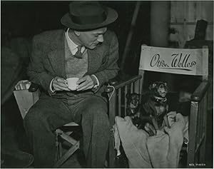 Image du vendeur pour The Third Man (Original candid still photograph of actor Joseph Cotten on set with two miniature Pinschers) mis en vente par Royal Books, Inc., ABAA