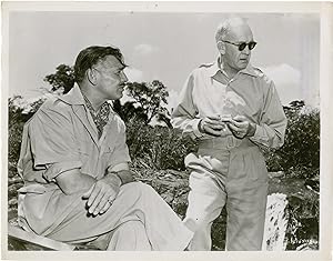Bild des Verkufers fr Mogambo (Original photograph of John Ford and Clark Gable on the set of the 1953 film) zum Verkauf von Royal Books, Inc., ABAA