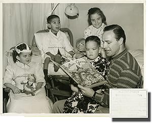 Original photograph of Marlon Brando reading to children