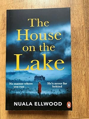 Seller image for THE HOUSE ON THE LAKE for sale by Happyfish Books