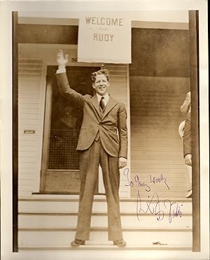 Seller image for PHOTO: "Rudy Vallee on a Porch with a Welcome Home, Rudy Sign.[Signed & Inscribed By Rudy Vallee]. for sale by Dorley House Books, Inc.