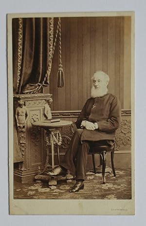 Carte De Visite Photograph: Studio Portrait of a Seated Elderly Gentleman.
