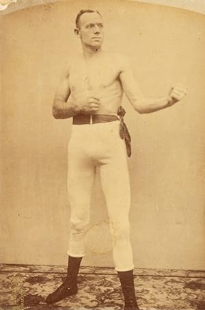 Imagen del vendedor de Photographic portrait of champion Anglo-New Zealand-Australian-American bare knuckle boxer Bob Fitzsimmons in a fighting stance, taken in New York in 1893. a la venta por Douglas Stewart Fine Books