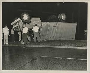 Archive of 48 original photographs of car accident scenes, 1961-1968