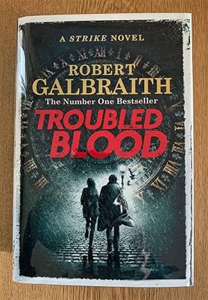 Seller image for Troubled Blood - Hand Picked 1st Printing Brand New Fine with Protected Dust Jacket. Professionally packed to protect your 1st edition for sale by UKBookworm