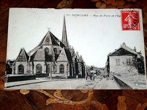 Bild des Verkufers fr Carte Postale Ancienne - 31 - NEMOURS. Rue de Paris et l'Eglise. zum Verkauf von JOIE DE LIRE
