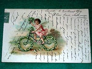 Image du vendeur pour Carte Postale Ancienne - FANTAISIE. Carte postale imprime en couleurs date 1905. Enfant  bicyclette orne de muguet. mis en vente par JOIE DE LIRE