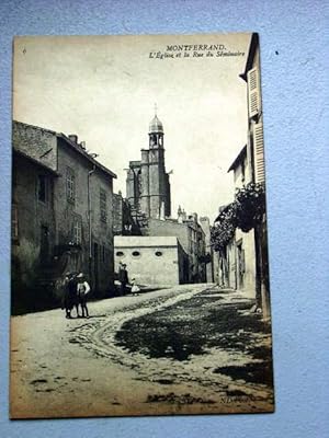 Bild des Verkufers fr Carte Postale Ancienne - MONTFERRAND. L'EGLISE ET LA RUE DU SEMINAIRE. zum Verkauf von JOIE DE LIRE