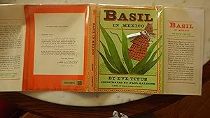 Seller image for Basil in MEXICO : A Basil Of Baker Street Mystery , SIGNED By Eve Titus, ILLUSTRATED BY Paul Galdone , RARE , ILLUSTRATED Blue & Red CVR HARDBACK OF BASIL ,English Mouse Detective IN SHERLOCK HOLMES ATTIRE & PIPE for sale by Bluff Park Rare Books