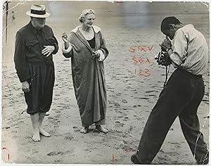 An original press photograph of Winston S. Churchill and Clementine Churchill on the beach at Hen...