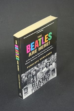 Image du vendeur pour The Beatles are here!: 50 years after the band arrived in America, writers, musicians, and other fans remember. mis en vente par Steven Wolfe Books