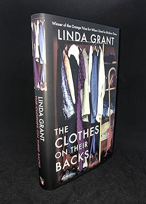 Image du vendeur pour The Clothes On Their Backs (Signed First Edition) mis en vente par Dan Pope Books