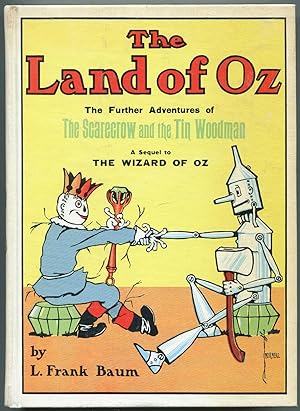 Seller image for The Land of Oz: Being an Account of the Further Adventure of the Scarecrow and Tin Woodman and also the strange experiences of the Highly Magnified Woggle-Bug, Jack Pumpkinhead, the Animated Saw-Horse and the Gump; the story being a Sequel to The Wizard of Oz for sale by Between the Covers-Rare Books, Inc. ABAA