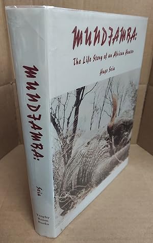 Bild des Verkufers fr MUNDJAMBA: THE LIFE STORY OF AN AFRICAN HUNTER (Signed) zum Verkauf von Second Story Books, ABAA