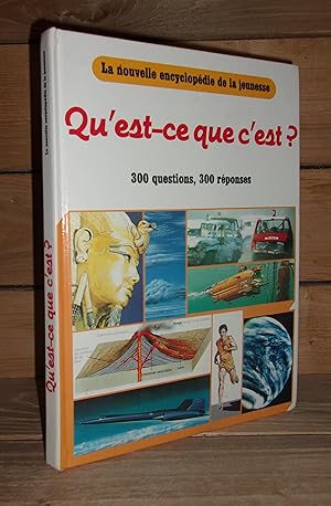 Bild des Verkufers fr QU'EST-CE QUE C'EST ? : La Nouvelle Encyclopdie De La Jeunesse : 300 Questions, 300 Rponses zum Verkauf von Planet's books