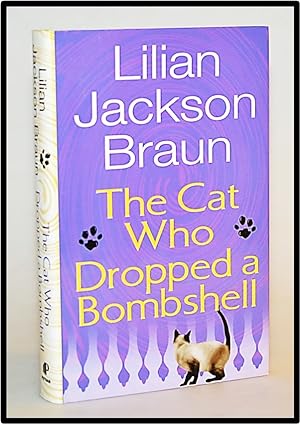 Imagen del vendedor de The Cat Who Dropped a Bombshell [Book 28 of Cat Who Series] a la venta por Blind-Horse-Books (ABAA- FABA)