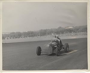 Archive of 14 vernacular photographs of open wheel races at the Iowa State Fair, circa 1950s