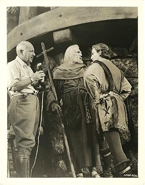 Image du vendeur pour The Crusades (Two original photographs of Cecil B. DeMille from the set of the 1935 film) mis en vente par Royal Books, Inc., ABAA