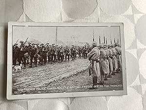 Issued by the YMCA Hut Fund. WW1 Military Postcard. 'The French Police Guard Salute British Troop...