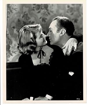 Seller image for A VINTAGE PUBLICITY PHOTOGRAPH of Hollywood Movie Stars INGRID BERGMAN and CHARLES BOYER in a scene from "Arch of Triumph". for sale by Blue Mountain Books & Manuscripts, Ltd.