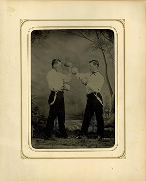 EXCEPTIONAL HALF PLATE TINTYPE OF A PAIR OF GENTLEMEN PUGILISTS WEARING BOXING GLOVES