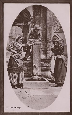 Imagen del vendedor de At The Pumper Edwardian Worker Women Real Photo Postcard a la venta por Postcard Finder