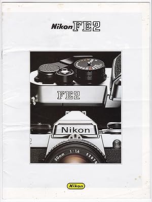 Prospekt zu NIKON FE2 mit diversen Informationen und Nomenklatur. Reich bebildert! Gedruckt in Ja...