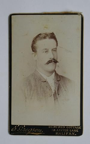 Carte De Visite Photograph. A Portrait of a Young Man with a Moustache.