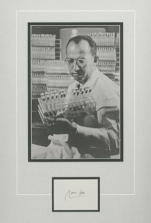 Bild des Verkufers fr Signed card of Jonas Salk. Original autograph. A signed card in sepia ink. Attractively matted and framed with a b/w portrait photograph of Salk. zum Verkauf von Ogawa Tosho,Ltd. ABAJ, ILAB