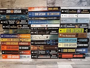 Image du vendeur pour John Grisham's Complete Novels. 24 Book Set (A Time to Kill, the Firm, the Pelican Brief, the Client, the Chamber, the Rainmaker, the Runaway Jury, the Partner, the Street Lawyer, the Testament the Brethren, a Painted House, the Summons, Bleachers.) mis en vente par Archives Books inc.