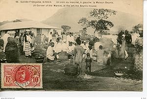 CPA GUINEE FRANCAISE. KINDIA. UN COIN DU MARCHE. A GAUCHE LA MAISON BEYNIS 1906