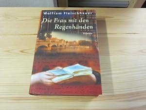 Imagen del vendedor de Die Frau mit den Regenhnden. Roman a la venta por Versandantiquariat Schfer