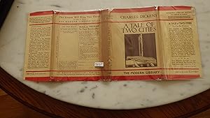 Imagen del vendedor de A Tale of Two Cities IN BEIGE & REDPICTORIAL WOODCUT ILLUSTRATED DUSTJACKET of Guillotine,1935, STATED First Modern Library#189 This is a very difficult title to find in the first edition stated Modern Library, Story of French Revolution a la venta por Bluff Park Rare Books