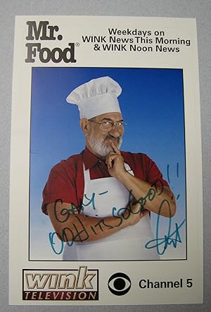 Mr. Food photo signed in green marker.