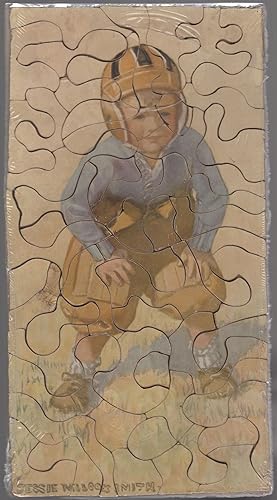 Bild des Verkufers fr Jigsaw Puzzle of a Little Boy Football Player zum Verkauf von Between the Covers-Rare Books, Inc. ABAA