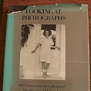 Seller image for Looking at photographs;: 100 pictures from the collection of the Museum of Modern Art, for sale by Snowden's Books