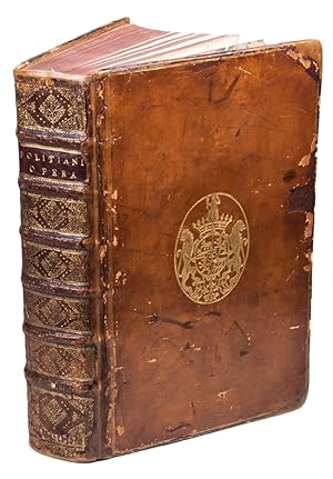 Seller image for Omnia opera Angeli Politiani, et alia quaedam lectu digna, quorum nomina in sequenti indice vedere licet.Venice, Aldus Manutius, 1498. Folio. Early 18th-century (?) polished calf, spine richly gilt in compartments with red morocco title label, both sides with triple gilt fillets along the edges and large gilt oval coat-of-arms in the centre, inner dentelles, marbled endpapers. The coat of arms is of Henri-Louis Lomnie, comte de Brienne (1658-1743), son of Louis Henry Lomnie de Brienne. for sale by ASHER Rare Books