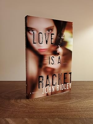 Imagen del vendedor de Love Is a Racket - LRBP a la venta por Little River Book Peddlers