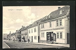 Ansichtskarte Usingen, Obergasse mit Gasthaus zur Sonne und Schreibwarengeschäft von Aug. Weininger
