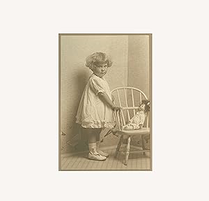 Cute, Poignant Sepia Photograph Portrait of a Curly-Haired Little Girl Toddler in White Dress wit...