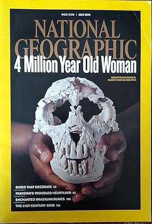 Image du vendeur pour National Geographic July 2010 4 Million Year Old Woman / 'Evolutionary Road - The Middle Awash in Ethiopia is humanity's hometown' by Jamie Shreeve; 'Birth of Bipedalism: Sex might have been the motivation'; 'A tale of Donald's Toer - To woo a mate, male bowerbirds decorate, lavishly' by Virginia Morell; 'Pakistan's Heartland - Punjab is prosperous, populous . and a Taliban target' by John Lancaster; 'Dazzling Brazilian Dunes - Fish splash in lagoons, goast graze .' by Ronaldo Ribeiro; 'The 21st Century Grid - Can we fix the infrastructure that powers our lives?' by Joel Achenbach mis en vente par Shore Books
