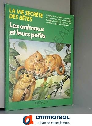 Imagen del vendedor de La vie secrte des btes : les animaux et leurs petits a la venta por Ammareal