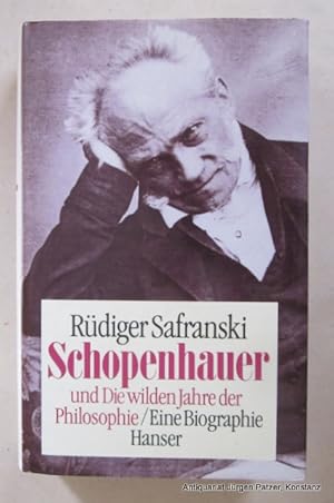 Seller image for Schopenhauer und Die wilden Jahre der Philosophie. Eine Biographie. 2. Auflage. Mnchen, Hanser, 1988. 556 S., 1 Bl. Or.-Pp. mit Schutzumschlag; dieser mit leichten Gebrauchsspuren. (ISBN 3446144900). for sale by Jrgen Patzer