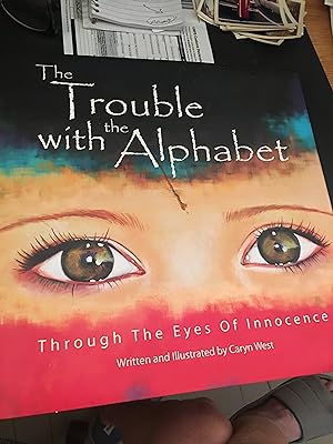 Signed. The Trouble with the Alphabet: Through The Eyes Of Innocence