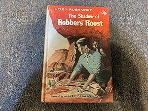Seller image for THE SHADOW OF THE ROBBERS ROOST for sale by Betty Mittendorf /Tiffany Power BKSLINEN