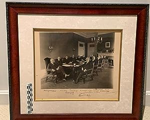 Bild des Verkufers fr PRESIDENT WARREN G. HARDING'S FIRST CABINET MEETING IN 1921 -- AN IMAGE OF PURE PRESIDENTIAL AND GOVERMENTAL POWER, BEARING THE SIGNATURES OF WHAT WERE TO BE THREE PRESIDENTS OF THE UNITED STATES, AND A FUTURE CHIEF JUSTICE OF THE US SUPREME COURT zum Verkauf von Gerard A.J. Stodolski, Inc.  Autographs