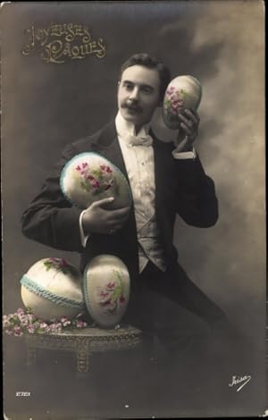 Ansichtskarte / Postkarte Glückwunsch Ostern, Mann im Frack mit Ostereiern