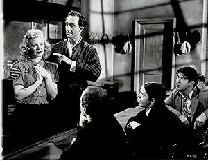 Immagine del venditore per A VINTAGE CONTINUITY LAYOUT PHOTOGRAPH depicting BASIL RATHBONE instructing GINGER ROGERS at his school for pickpockets in a scene from "HEARTBEAT". venduto da Blue Mountain Books & Manuscripts, Ltd.