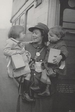 Immagine del venditore per Lady Bus Conductor in WW2 Children In Bomb Raid Postcard venduto da Postcard Finder